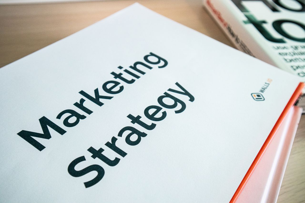 services-03 Close-up of a marketing strategy document on a desk, ideal for business content.